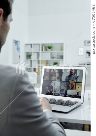 Talking to colleagues via video conferencing Talking to colleagues via video conferencing 67503468