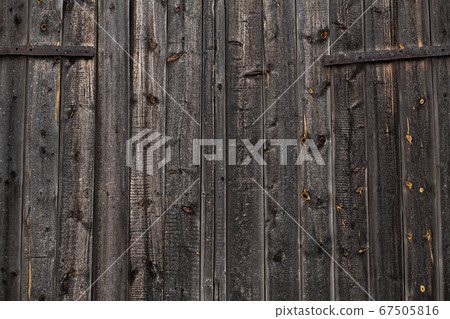 Close-up Large wooden gate and dried wood. Wood Close-up Large wooden gate and dried wood. Wood 67505816