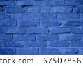 Classic blue brick wall texture close up. 67507856