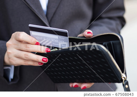 Business women use credit cards Business women use credit cards 67508043