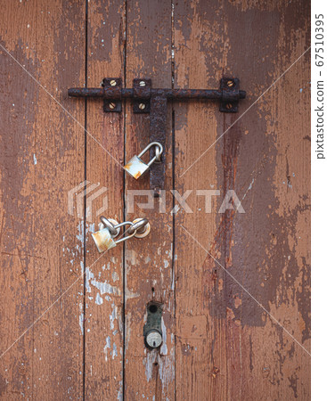 Lock on a door. Lighthouse entrance at Port d 67510395