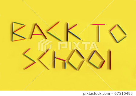 Words Back to School from pencils on a yellow background. Words Back to School from pencils on a yellow background. 67510493