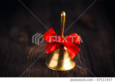 Antique brass hand bell Antique brass hand bell 67511457