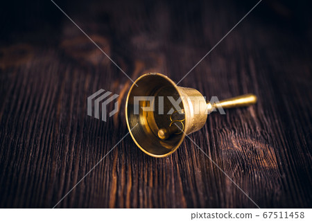 Antique brass hand bell 67511458