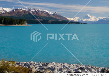Distant view of Mount Cook across Lake Pukaki, South Island, New Zealand Distant view of Mount Cook across Lake Pukaki, South Island, New Zealand 67511636