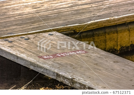 No Fishing sign painted on a wooden deck in Provo No Fishing sign painted on a wooden deck in Provo 67512371