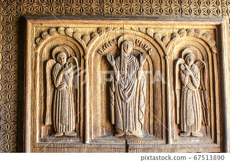 Part of a wooden door with carved angels in the Church of the Holy Martyr Hripsime in Echmiadzin 67513890