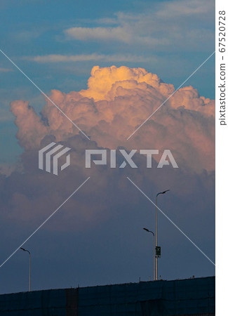 Highway with sunset and rain clouds 67520728