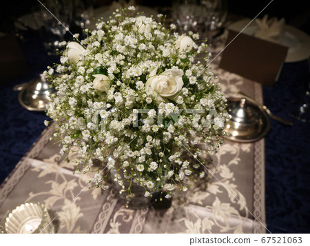 Bouquet of white roses and hazy grass Bouquet of white roses and hazy grass 67521063