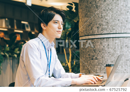 Young men working in the office 67525792