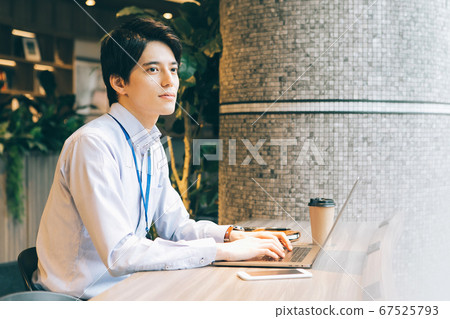 Young men working in the office 67525793