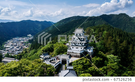 Aerial view of Gujo Hachiman Castle in summer taken by drone 67526256