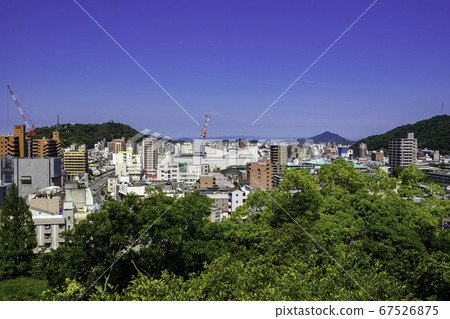Dogo Onsen, Matsuyama City, Ehime Prefecture, with a view of Matsuyama Castle from Dogo Park Dogo Onsen, Matsuyama City, Ehime Prefecture, with a view of Matsuyama Castle from Dogo Park 67526875