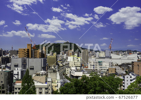 Dogo Onsen, Matsuyama City, Ehime Prefecture, with a view of Matsuyama Castle from Dogo Park Dogo Onsen, Matsuyama City, Ehime Prefecture, with a view of Matsuyama Castle from Dogo Park 67526877