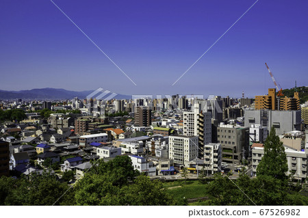 Dogo Onsen, Matsuyama City, Ehime Prefecture, overlooking the city center of Matsuyama from Dogo Park 67526982