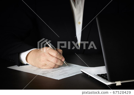 Close up businessman signing contract making a Close up businessman signing contract making a 67528429