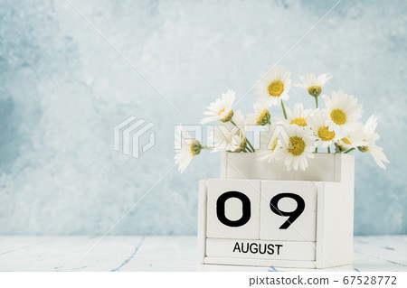 White cube calendar for august decorated with 67528772
