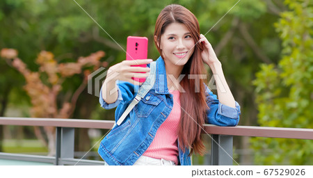 young asian girl take selfie 67529026