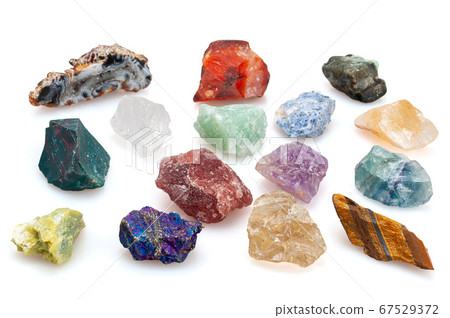 Different stones minerals on a white background. Different stones minerals on a white background. 67529372