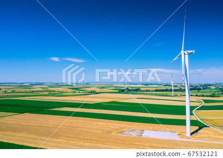 Aerial view of wind turbine. Windmills at harvest 67532121
