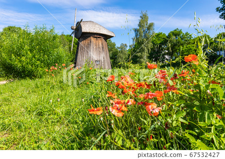 Wooden mill in the countryside. 67532427