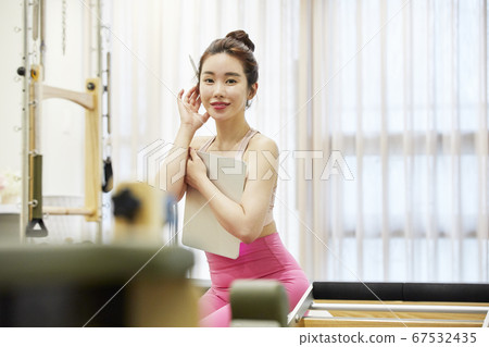 Young woman,exercise,pilates,sport 67532435