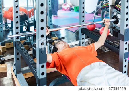 Men training in a private gym Men training in a private gym 67533629