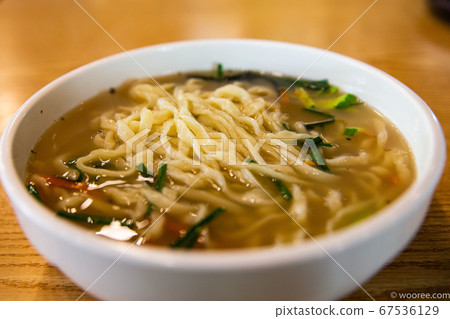Hand kalguksu, Korean traditional food with homemade kalguksu in thick broth 67536129