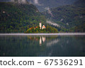 Picturesque view to the Bled lake with Pilgrimage Church of the Assumption of Maria at Bled island, Bled, Slovenia 67536291
