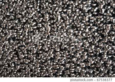 kitchen sponge metal background close-up 67536377
