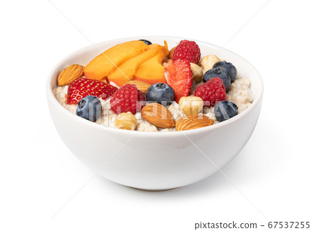 prepared oatmeal with fruits and berries 67537255