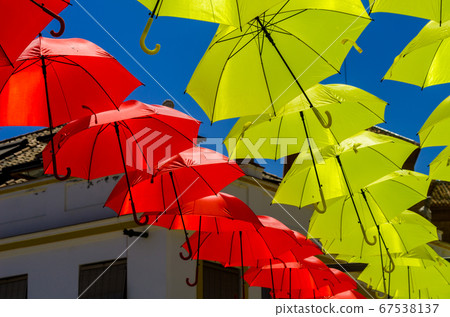 Colourful umbrellas urban street decoration. Colourful umbrellas urban street decoration. 67538137