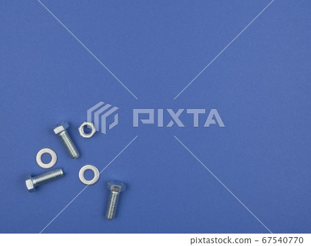 Bolts, nuts and pucks for fastening on a blue 67540770