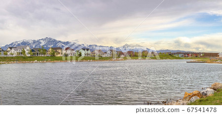 Daybreak over Oqirrh lake in Utah on a cloudy day 67541478