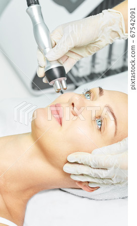Dermatology skin care facial therapy. Medical spa anto wrinkles procedure. Woman Dermatology skin care facial therapy. Medical spa anto wrinkles procedure. Woman 67542091