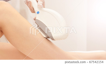 Hair laser removal service. IPL cosmetology device. Professional apparatus. Woman soft skin care Hair laser removal service. IPL cosmetology device. Professional apparatus. Woman soft skin care 67542154