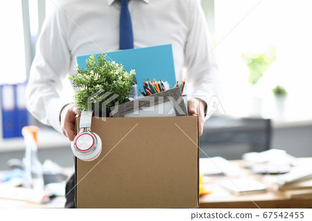 Man with personal items Man with personal items 67542455