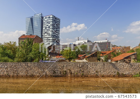 Miljacka river and buildings in Sarajevo, Bosnia and Herzegovina Miljacka river and buildings in Sarajevo, Bosnia and Herzegovina 67543573