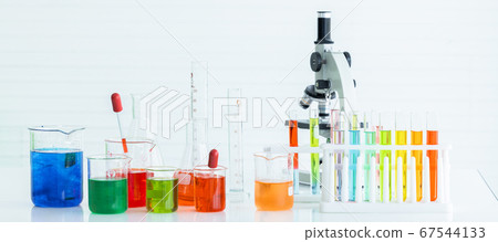 Microscope on desk at home, Young scientist making Microscope on desk at home, Young scientist making 67544133