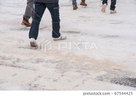 Road surface in Sapporo with snow 67544425