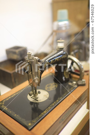 Nostalgic and antique old sewing machine 67546029