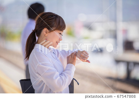 Woman at the station Woman at the station 67547808