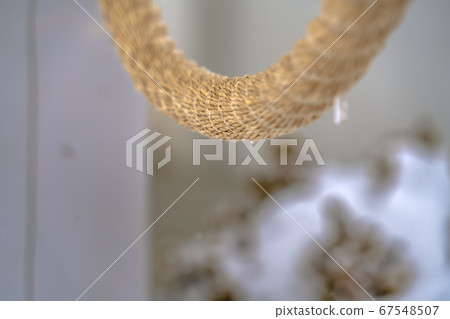 Details of rope against blurred snowy background Details of rope against blurred snowy background 67548507