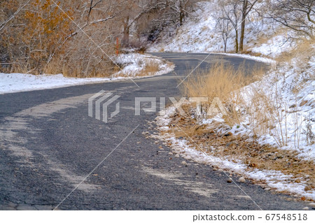 Curvy road on snowy mountain in Salt Lake City Curvy road on snowy mountain in Salt Lake City 67548518