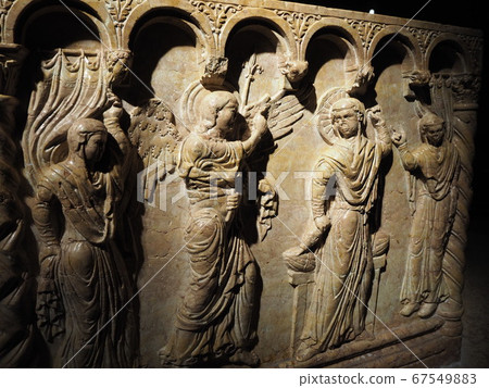 Italy, angel sculpture illuminated in the dark 67549883