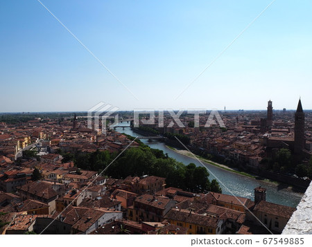 Verona, Italy, a brick-colored cityscape seen from the university 67549885