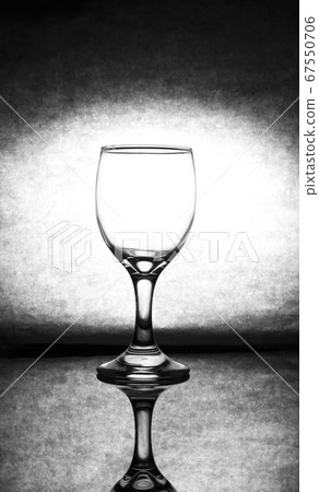 Transparent wine glass, placed on the glass floor 67550706