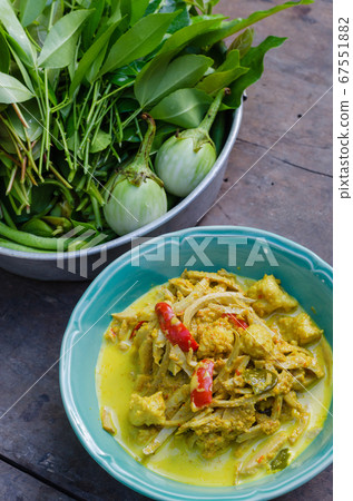 "Kaeng Kua Luk Chin Pla" or "Thai Spicy Fish Ball Curry" Is a Traditional Spicy Homemade Curry is Popular In Country Side of Thailand. "Kaeng Kua Luk Chin Pla" or "Thai Spicy Fish Ball Curry" Is a Traditional Spicy Homemade Curry is Popular In Country Side of Thailand. 67551882