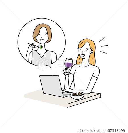 A woman having an online drinking party with a computer A woman having an online drinking party with a computer 67552499
