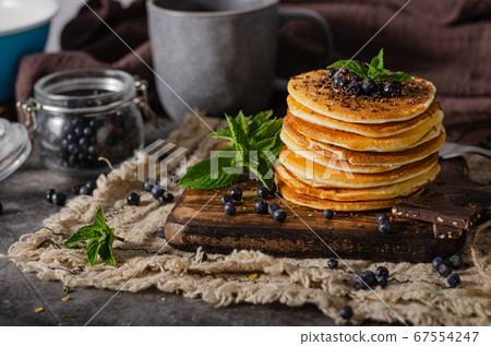 Vintage pancakes with berries Vintage pancakes with berries 67554247
